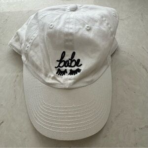 White Cap with Embroidered Design